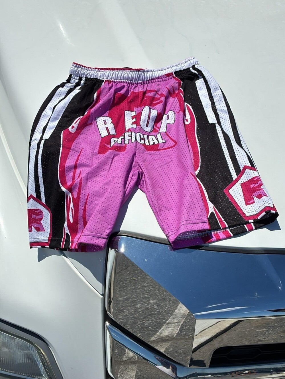 Black Men’s Athletic Shorts with Vibrant Multicolor Graphic